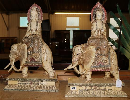 A pair of large bone groups of a Bodhisattva on elephant back